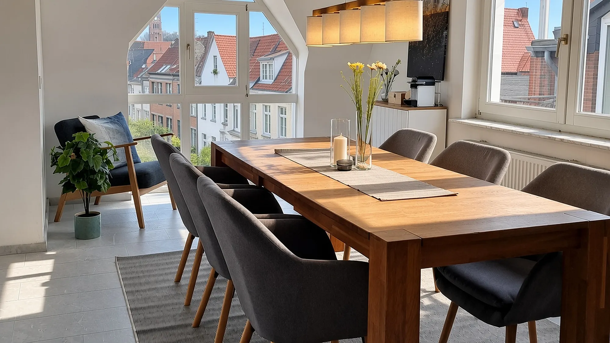 Livora Rooftop – bright dining area under the gable window